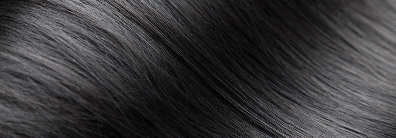 Close up on straight long black hair.