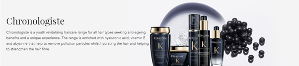 Bottles and jars for Kerastase's Chronologiste line. Every container is black with a gold lid. Pictured behind them is a plate with white powder and some black pearls.