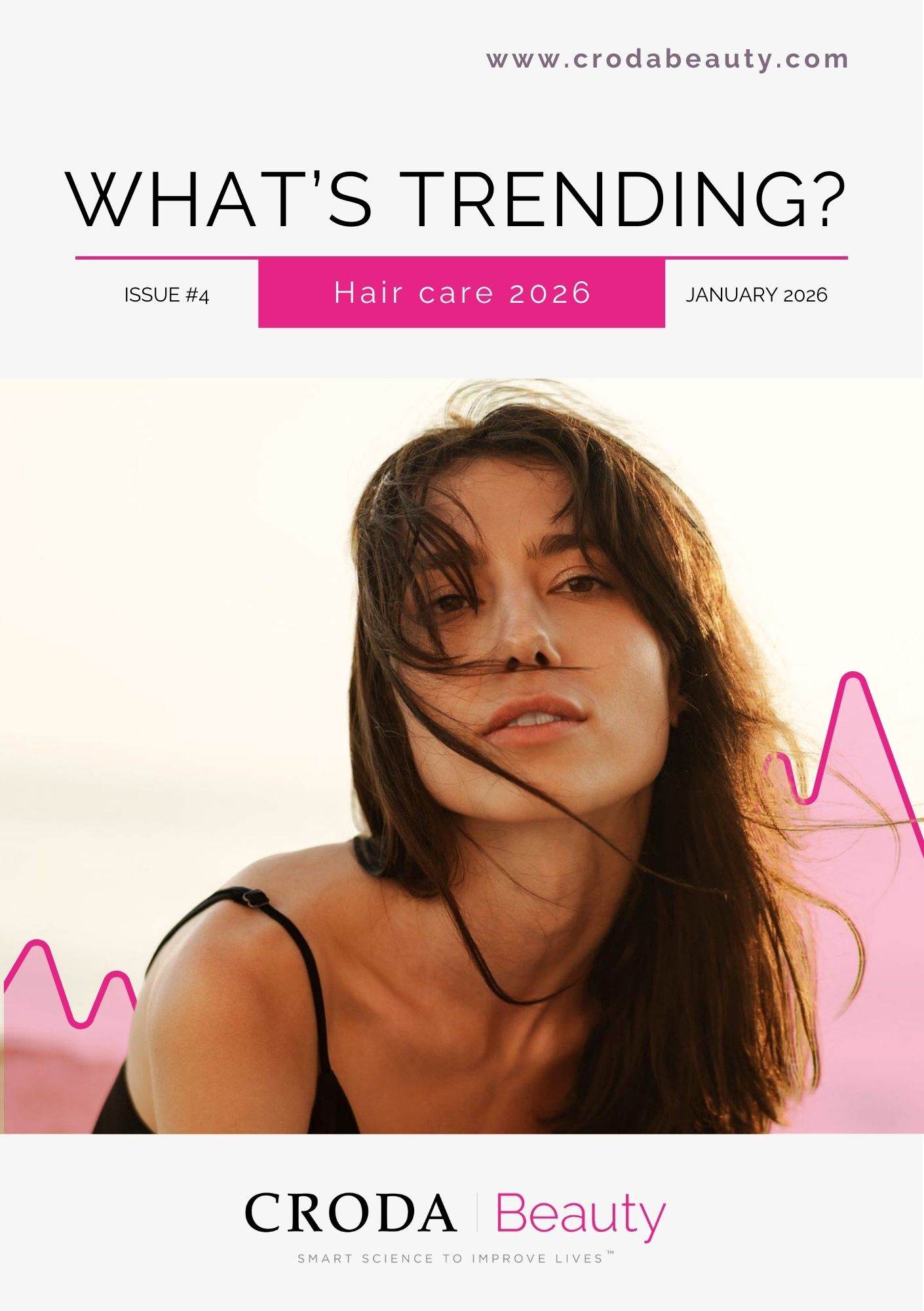 Cover of the hair care trends 2026 trend snippet booklet. Woman on front cover with hair across face. 