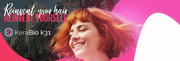 Kerabio K31 promo image. The head of a smiling white woman with red hair. Her hair is flying out as if she is jumping or dancing. Text reads "reinvent your hair, reinvent yourself, kerabio k31"