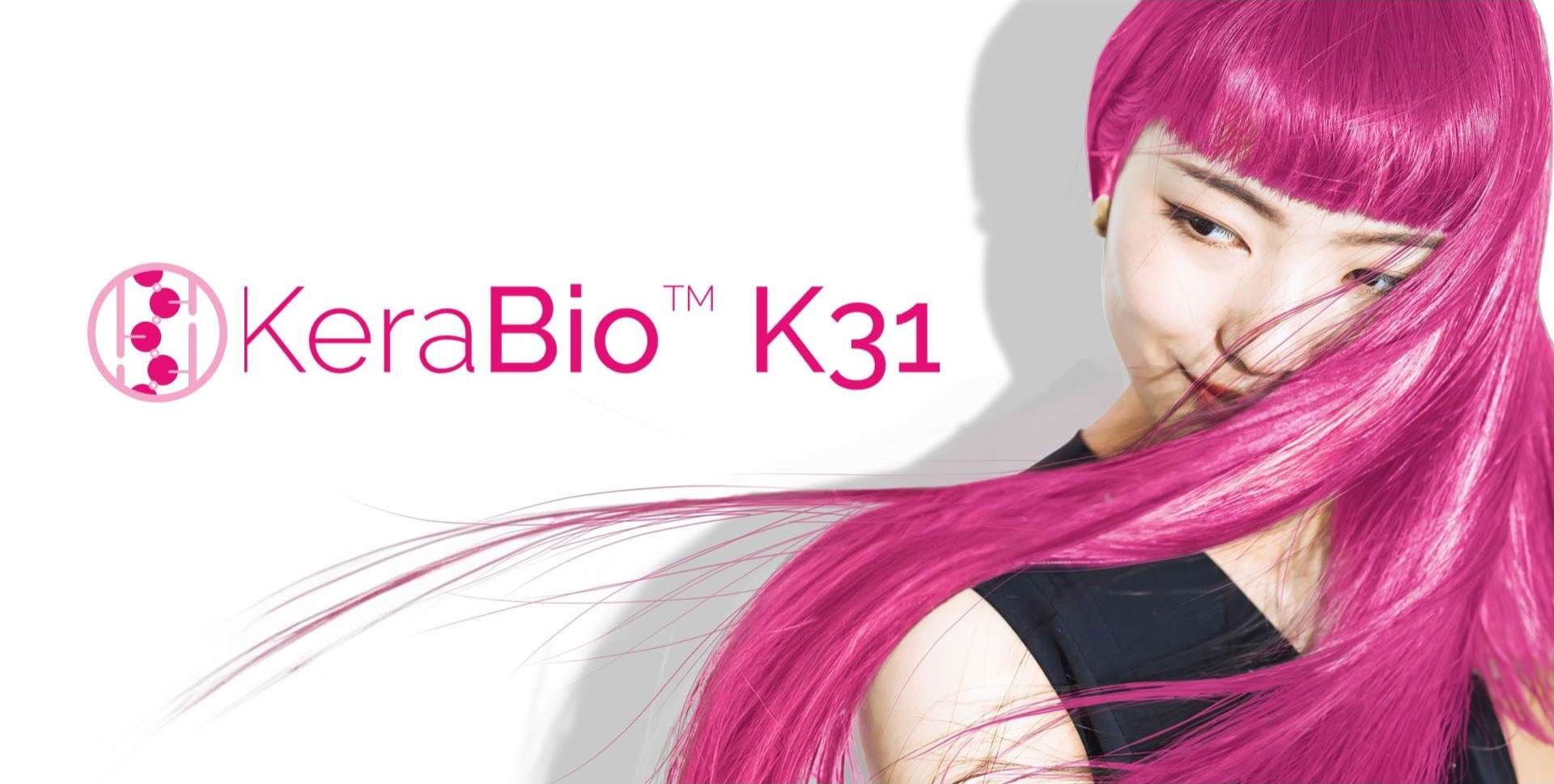 East asian woman in her 20s with long, straight, bright pink hair.