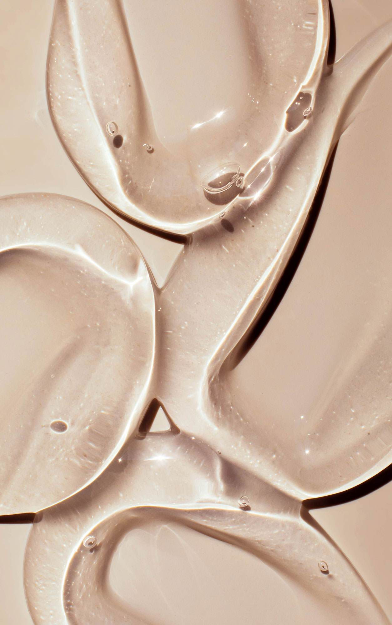 clear serum on beige background