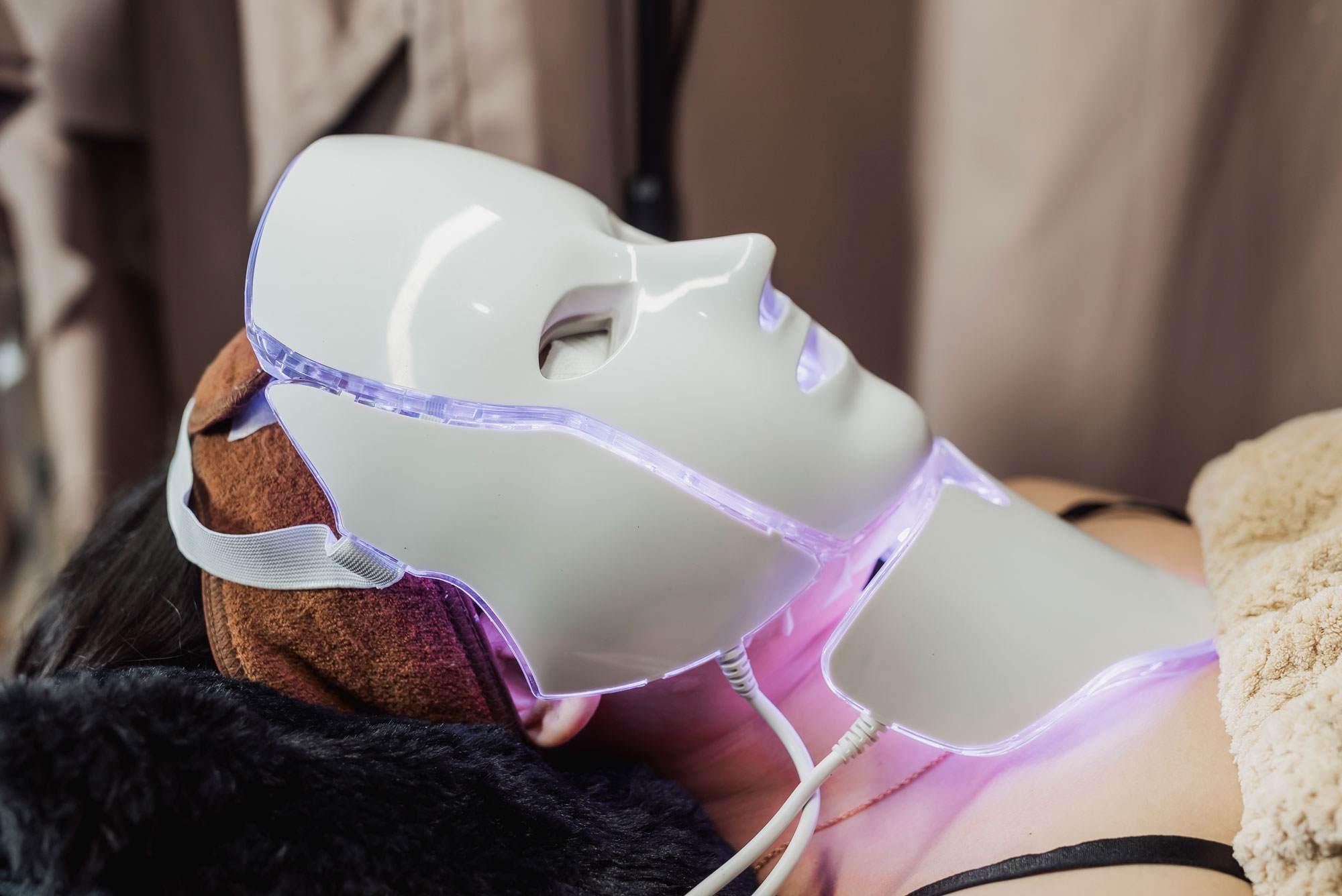 White mask over a woman's face.