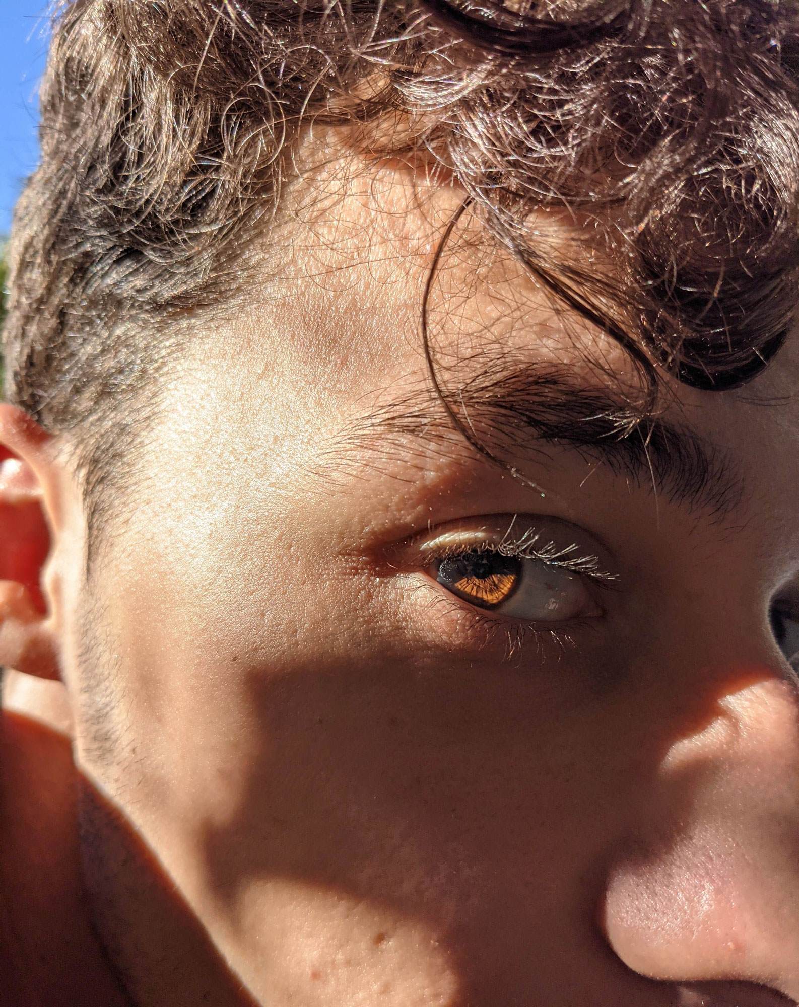 side of mans face outside