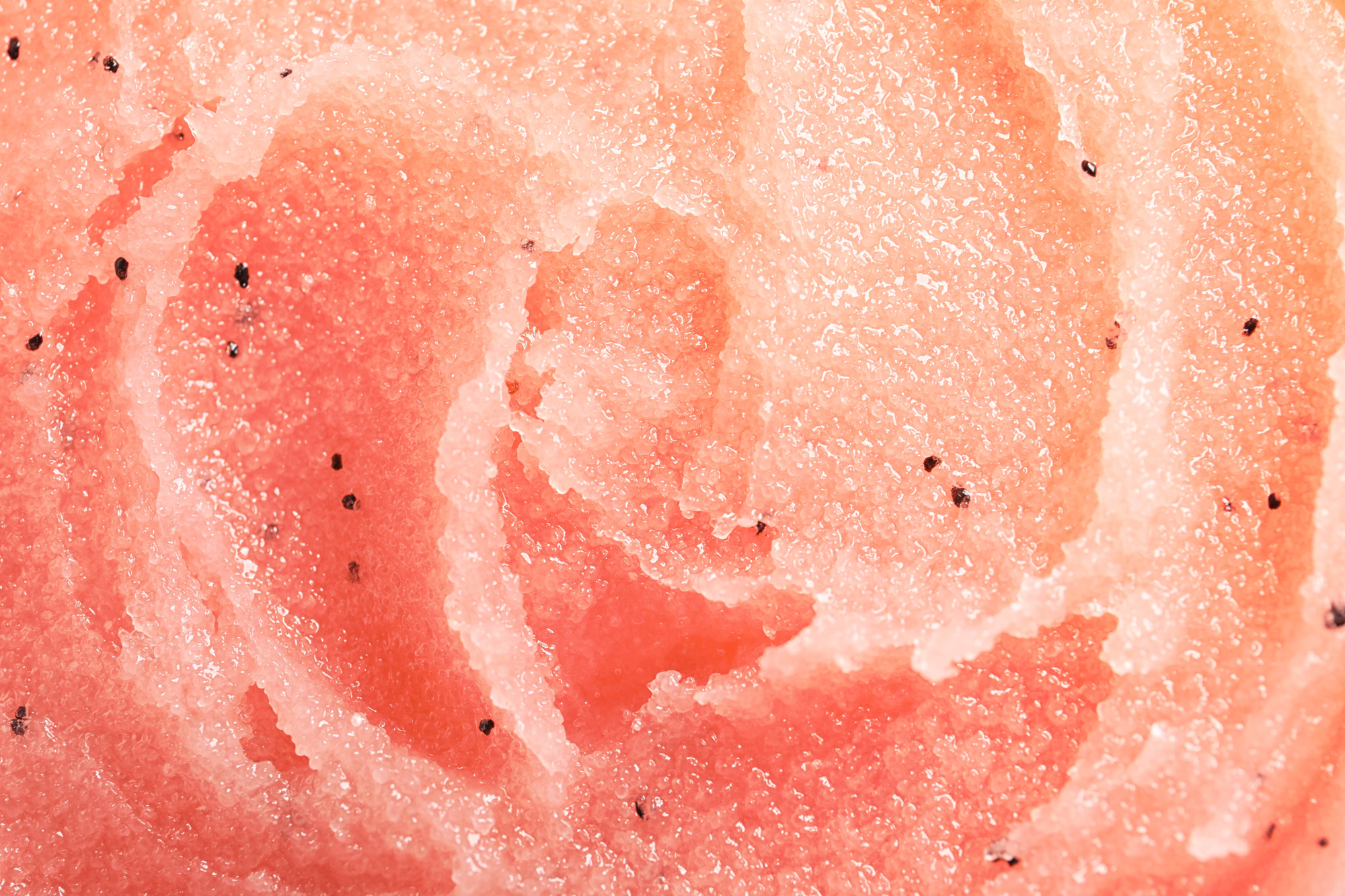 Extreme close-up on a pink shape and play cleansing sand.