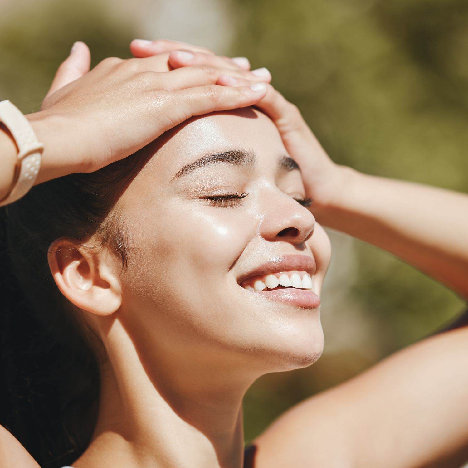 natragem smiling women eyes shut sun on face female hispanic latinx brown hair sun care