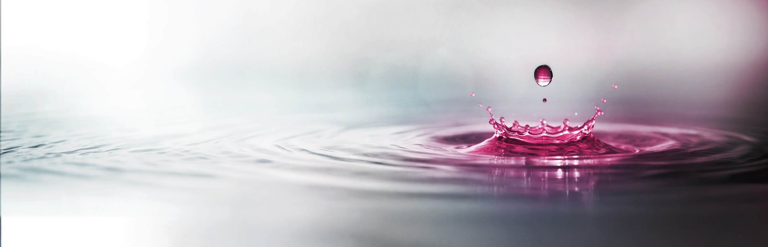Pink water drop creating a ripple to represent Croda Beauty at incosmetics global 2026