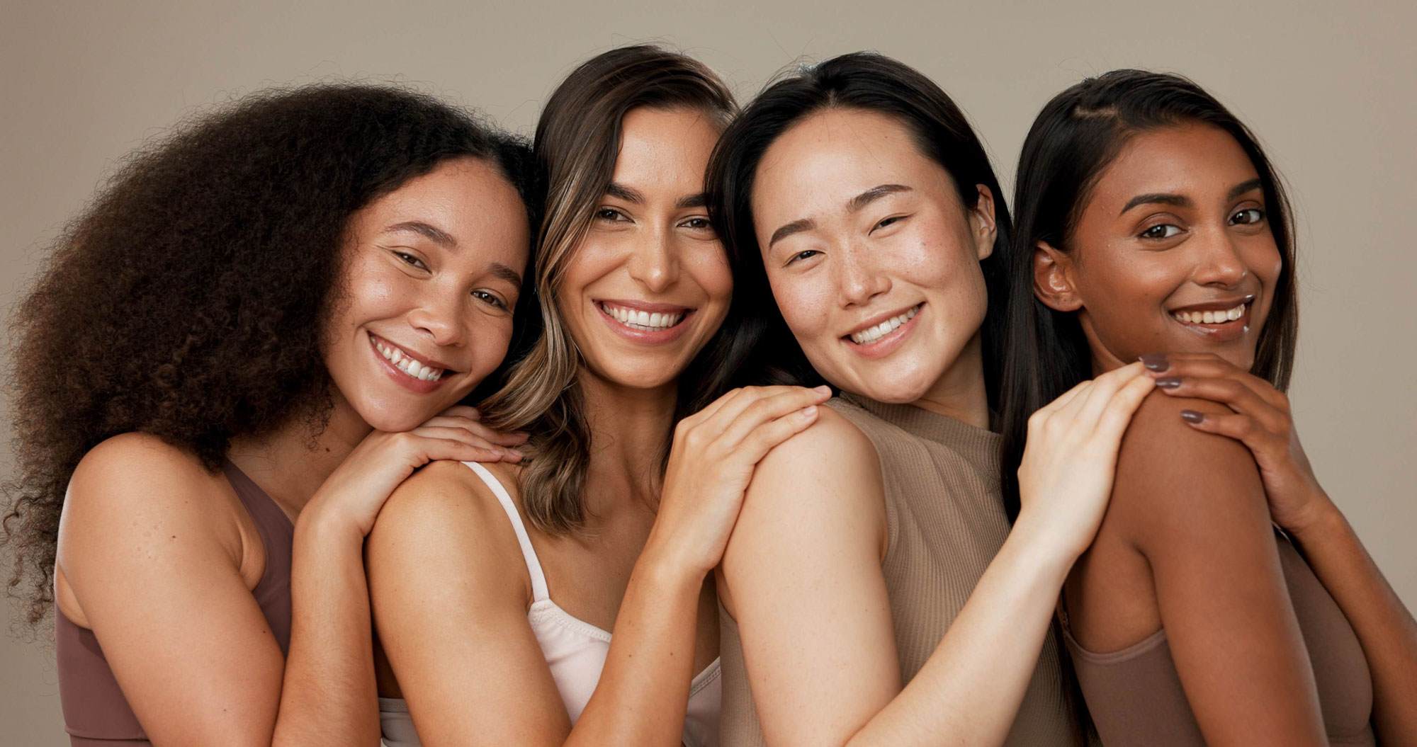 Diverse group of 4 females smiling