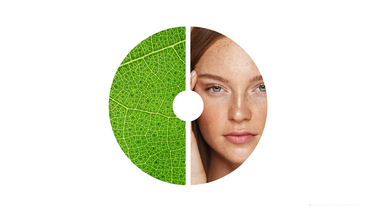 On the left side of the image is a microscopic close-up on plant cells. On the right is the face of a young white woman with red hair and freckles looking directly into the camera.