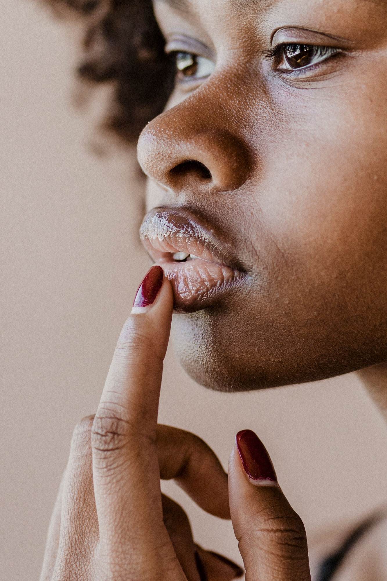 Black woman toching her lips